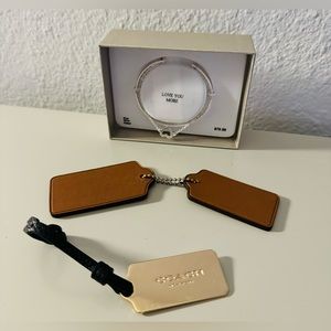 NWT silver plated bracelet w/attached charm, coach charm, & leather purse charm